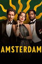 Promotional poster for 'Amsterdam' with three people in formal attire against a colorful background.